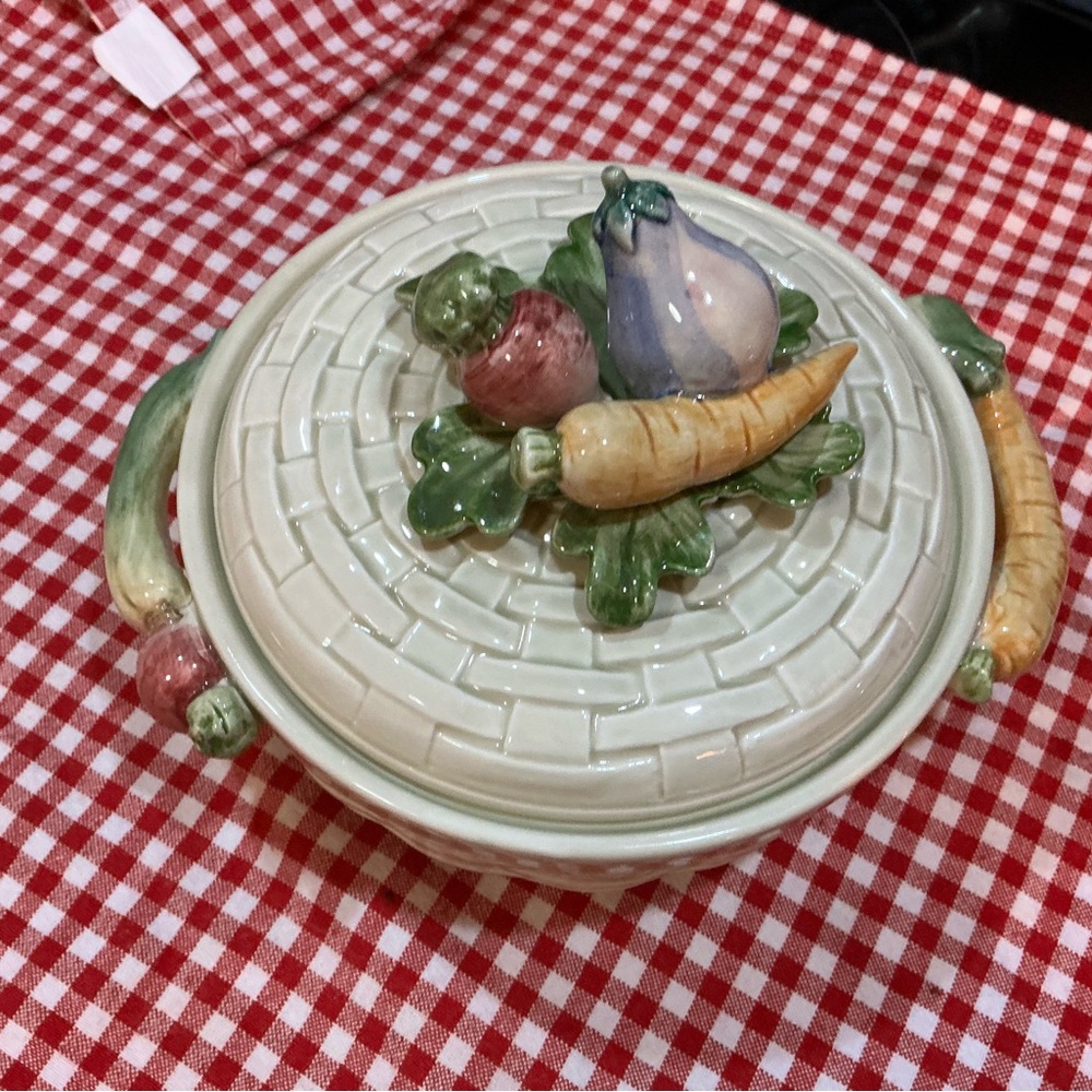 Lovely FITZ & FLOYD Veggie server.  
Basket weave with applied veggies/handles.